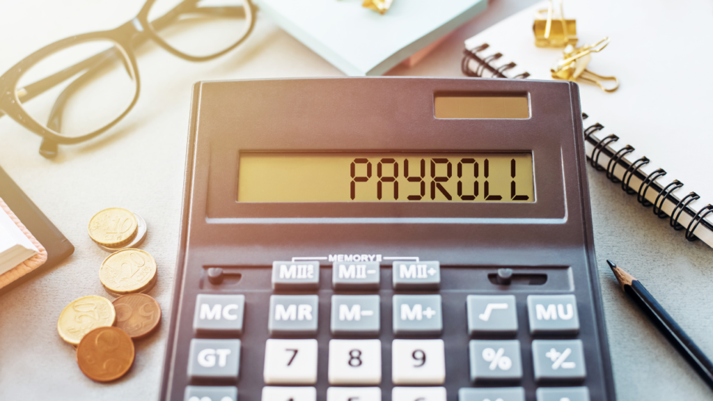 bookkeeping and payroll image of a calculator with payroll written on it